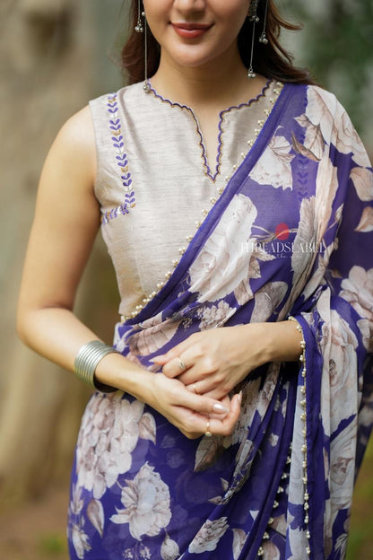 Purple chiffon floral saree with hand work blouse