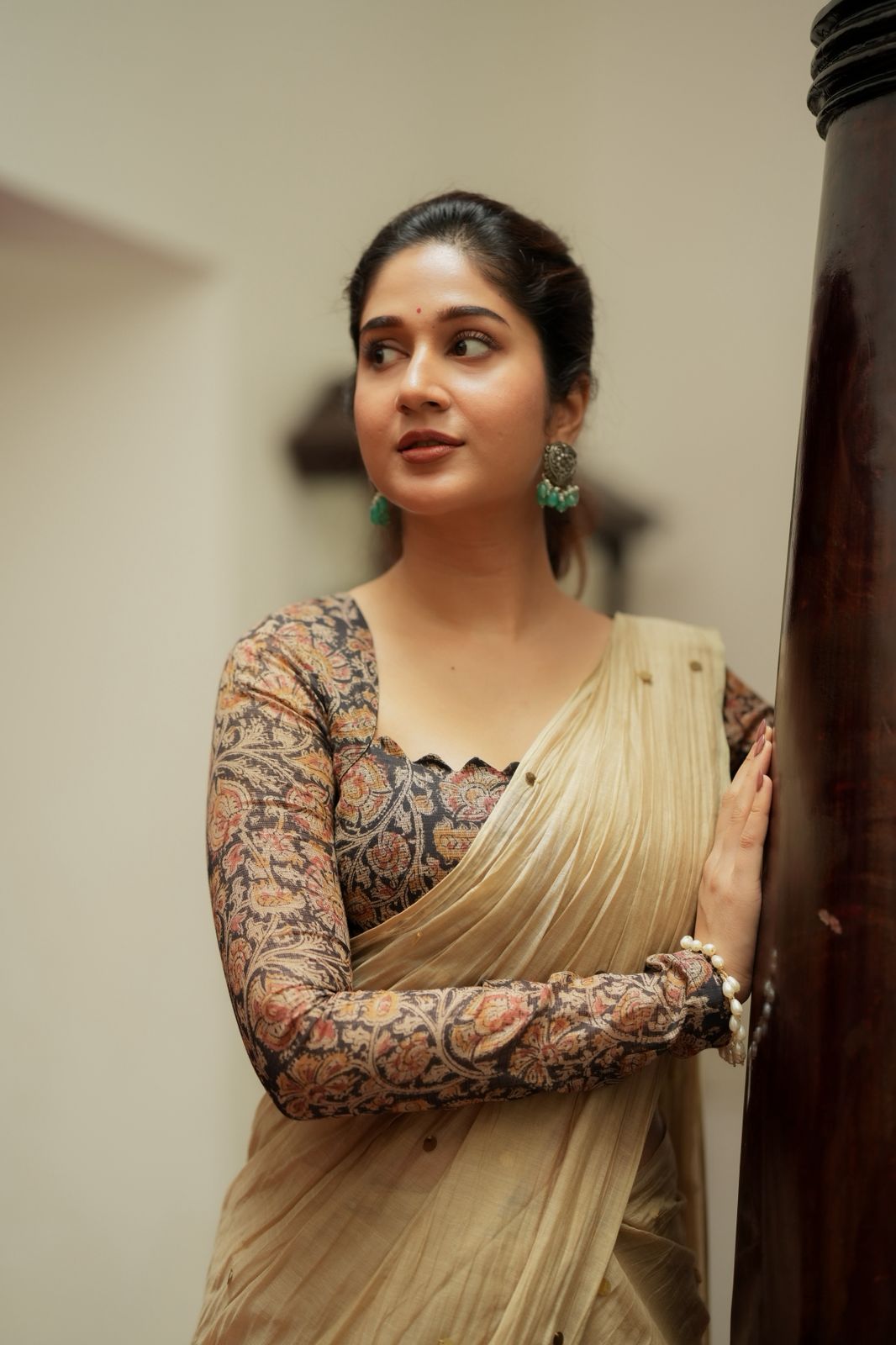 Cream malai chanderi saree with Ajrak print blouse