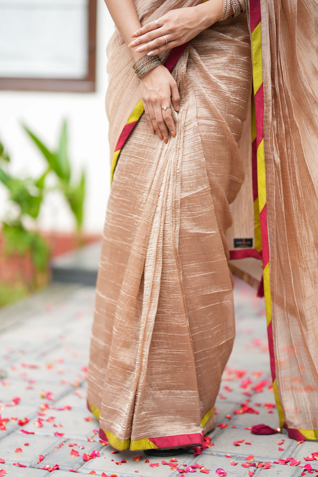 Antique gold tissue saree with parrot handwork blouse