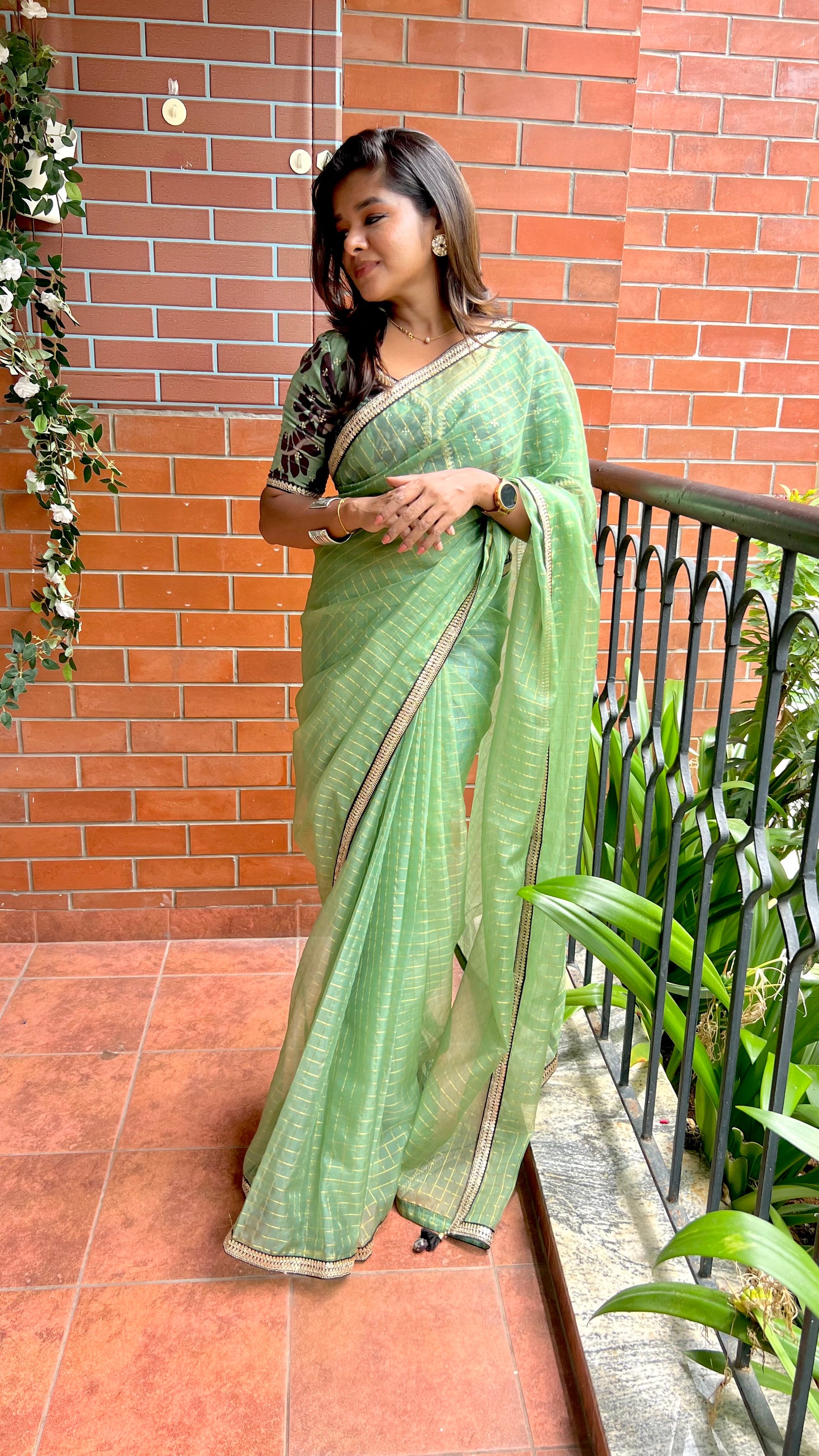 Fern green checked organza saree with embroidery blouse