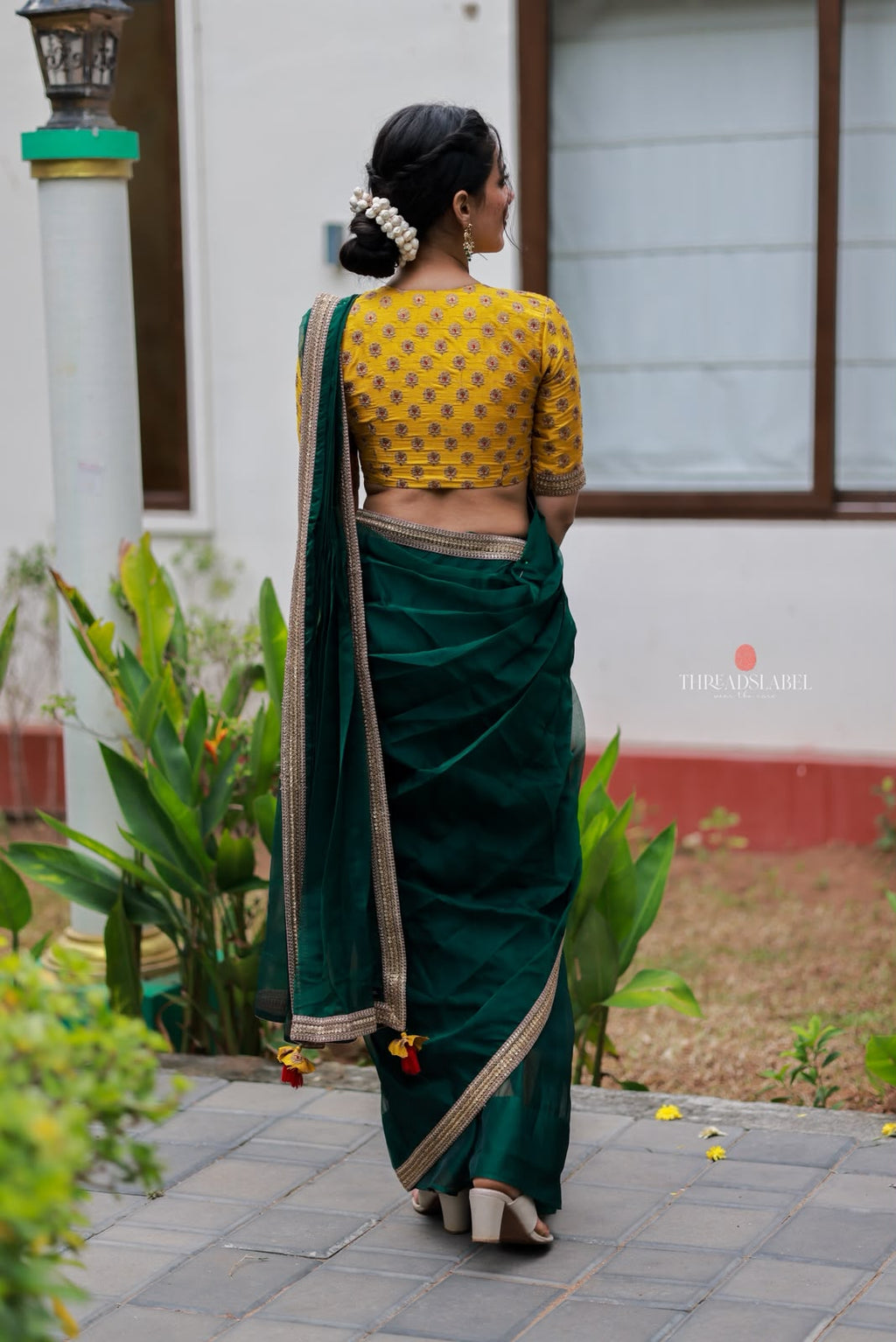 Green organza saree with yellow hand work blouse