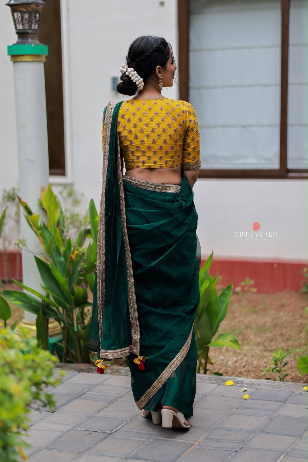 Green organza saree with yellow hand work blouse