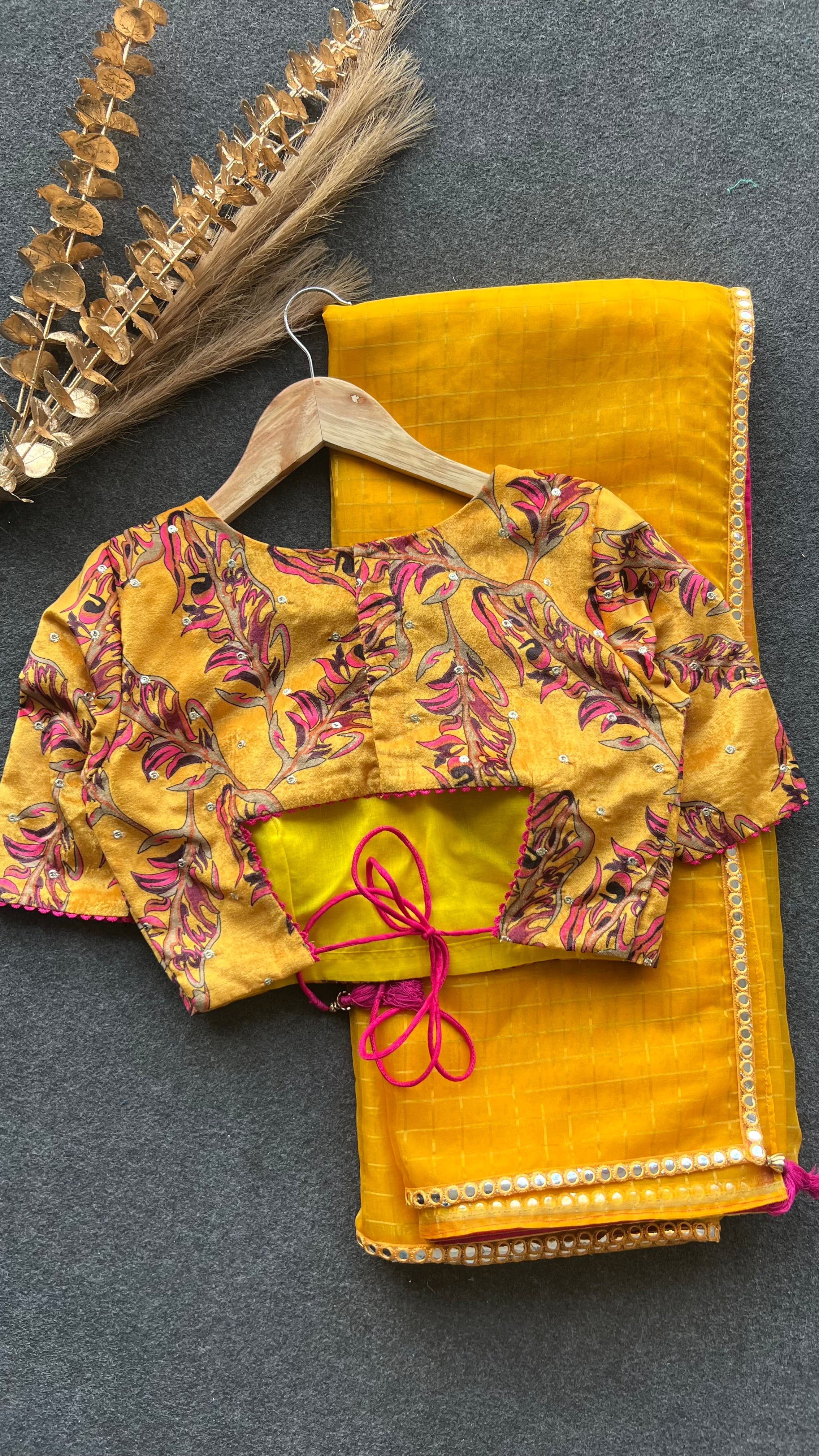 Yellow checked organza saree with velvet embroidery blouse
