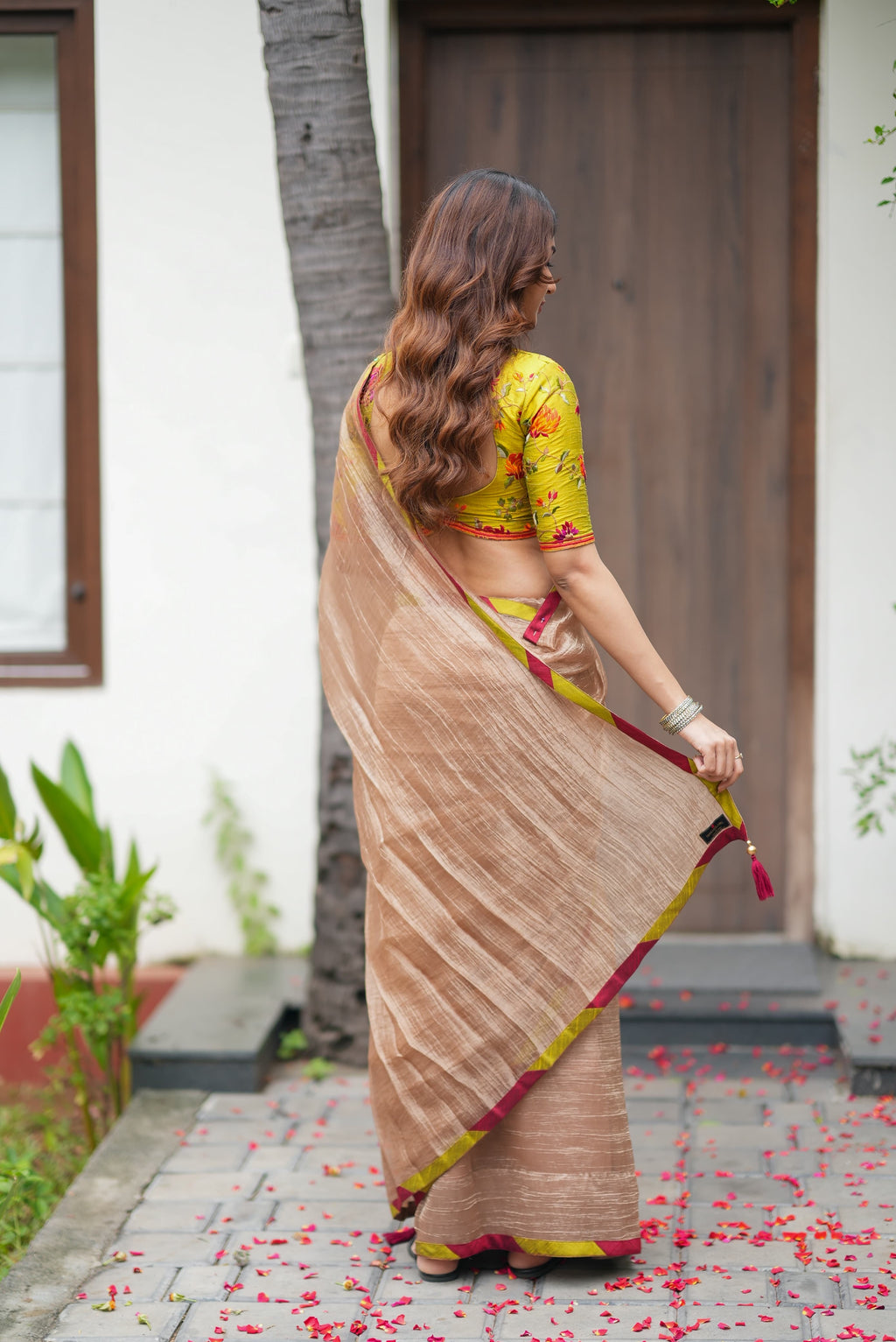 Antique gold tissue saree with parrot handwork blouse
