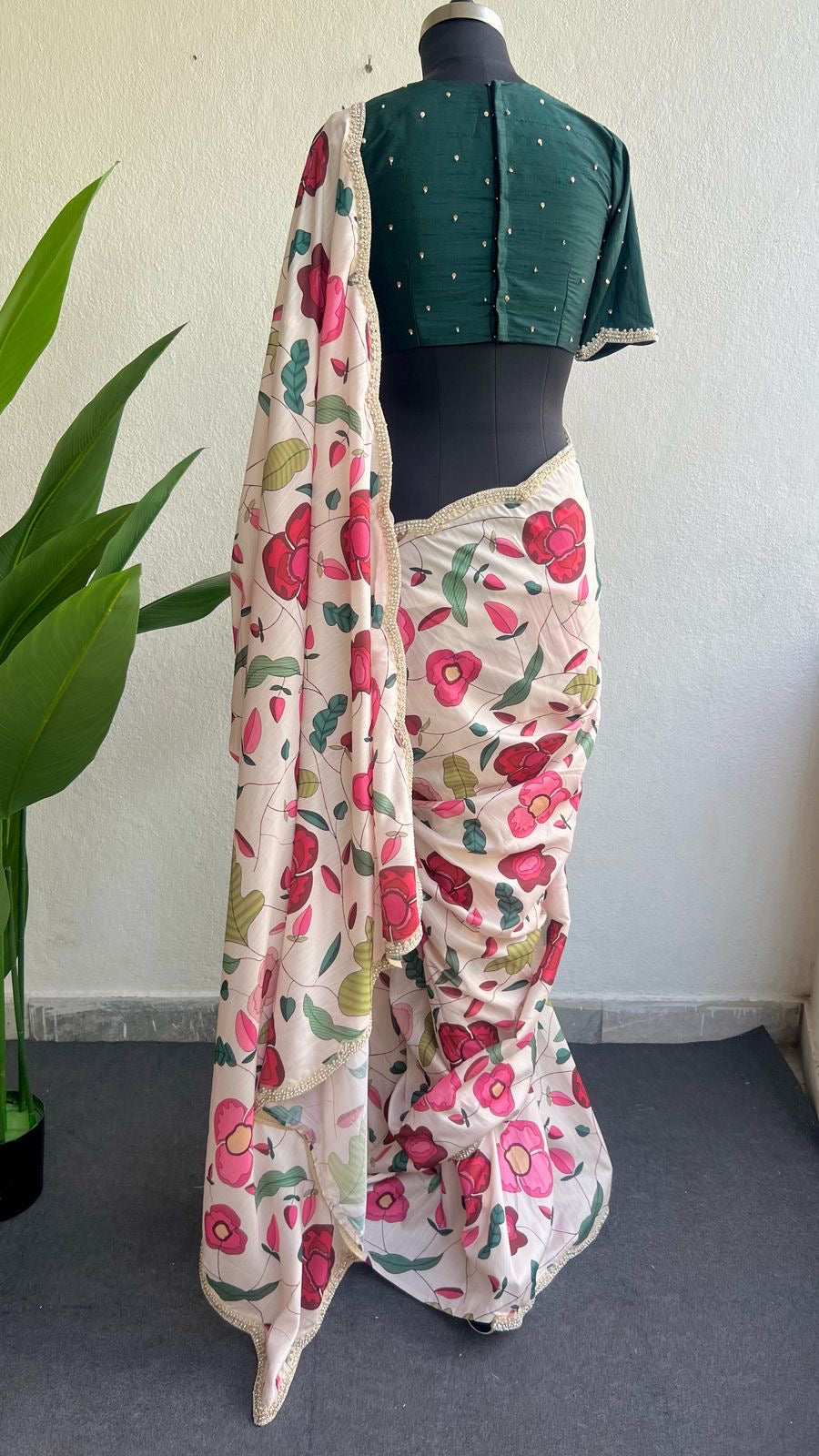 Half white floral kossa saree with green hand worked blouse
