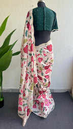 Half white floral kossa saree with green hand worked blouse