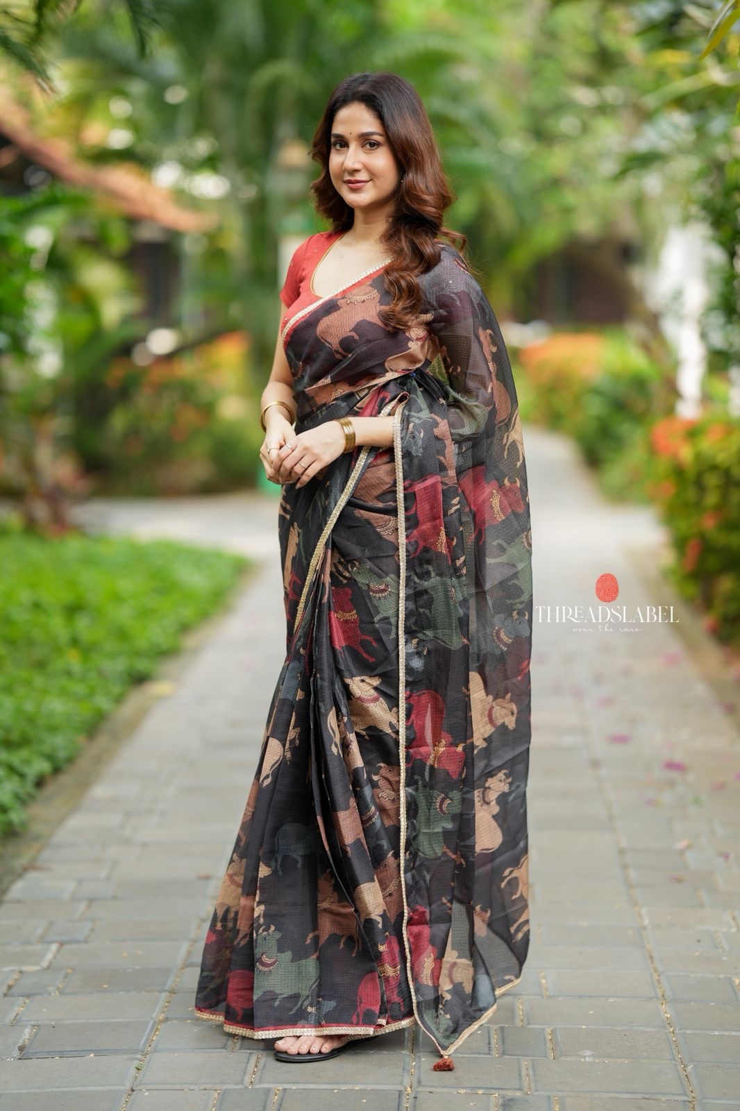 Black cow kota saree with paisley hand work blouse