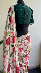Half white floral kossa saree with green hand worked blouse