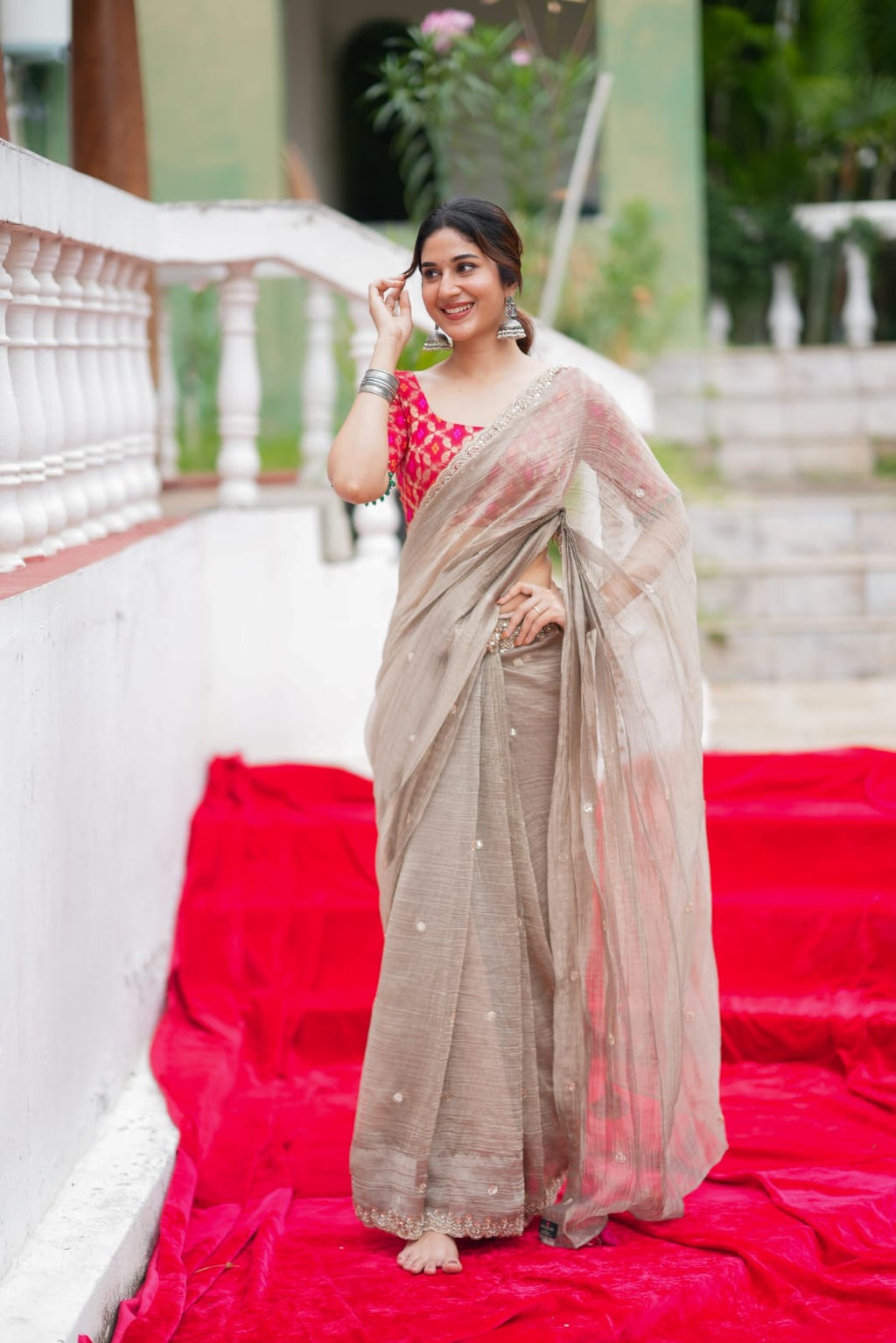 Grey tissue saree with red banarasi blouse