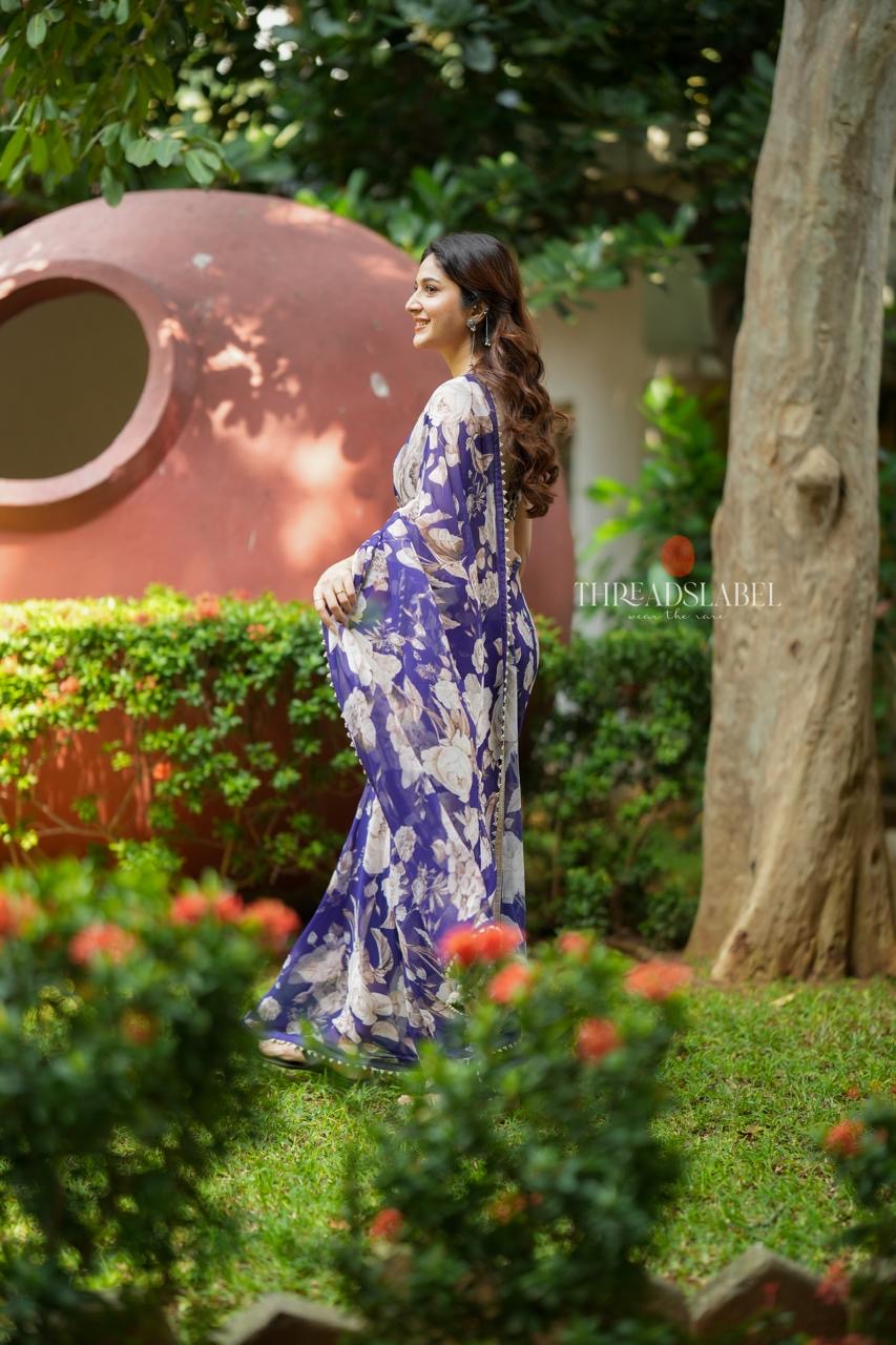 Purple chiffon floral saree with hand work blouse