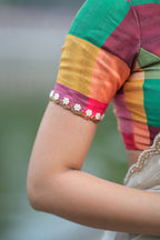 Beige georgette tissue saree with multi hand work blouse