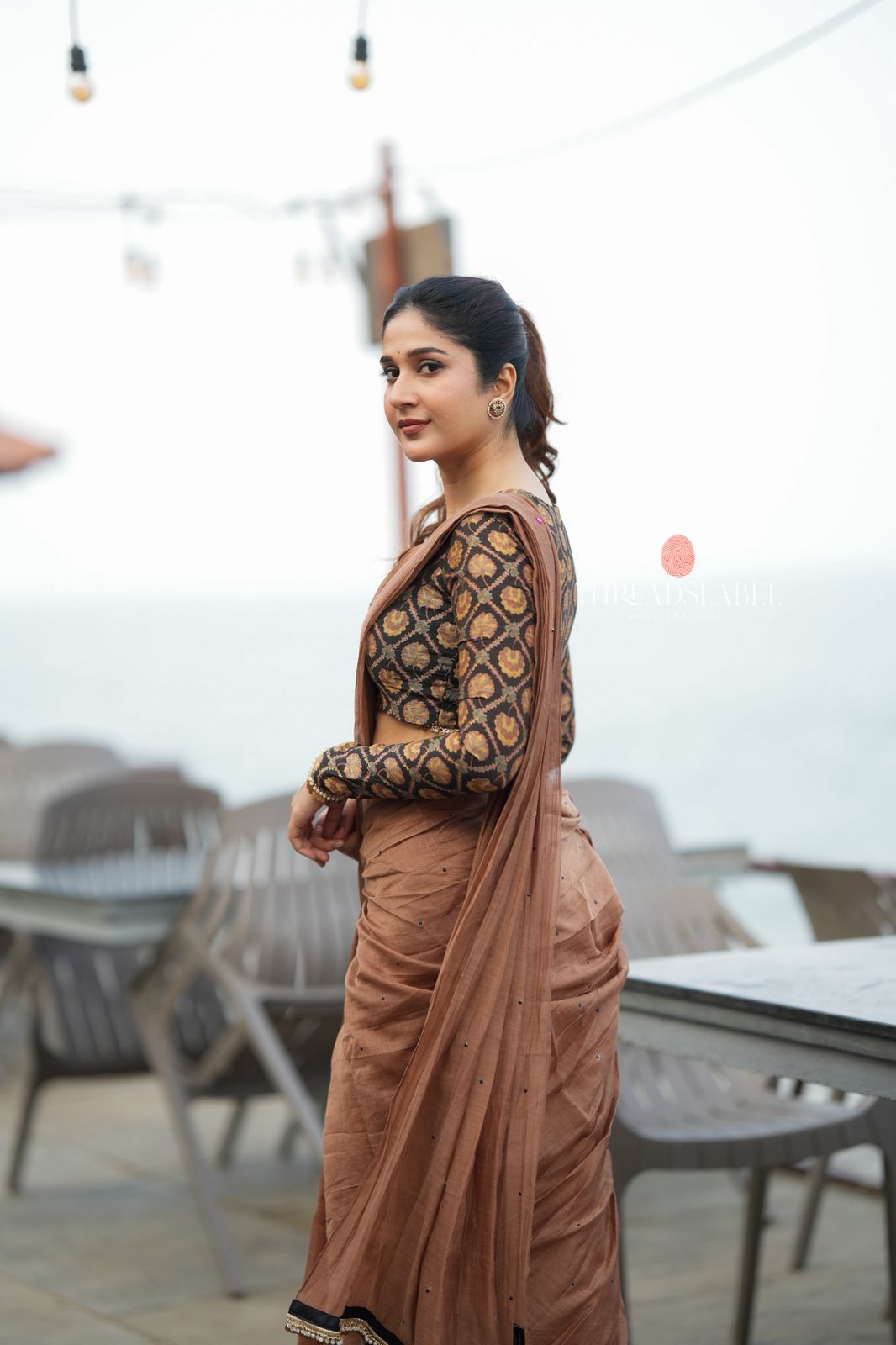 Brown malai chanderi saree with Ajrak print blouse