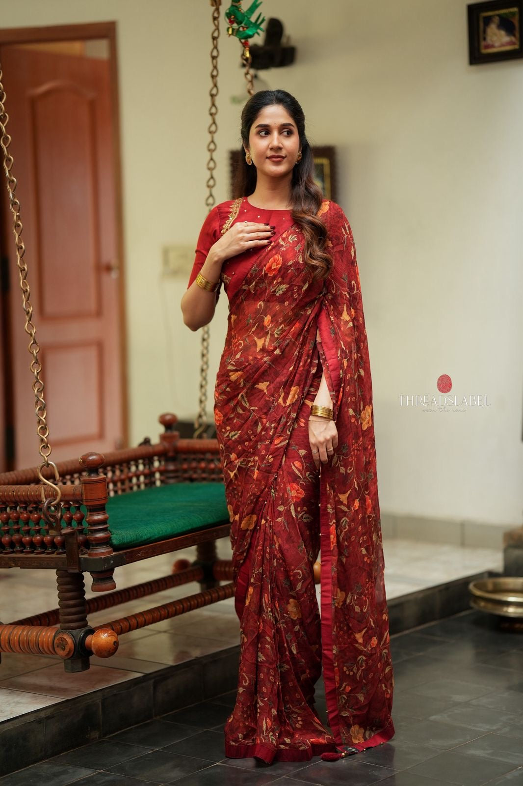 Maroon chiffon floral saree with hand work blouse