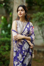 Purple chiffon floral saree with hand work blouse