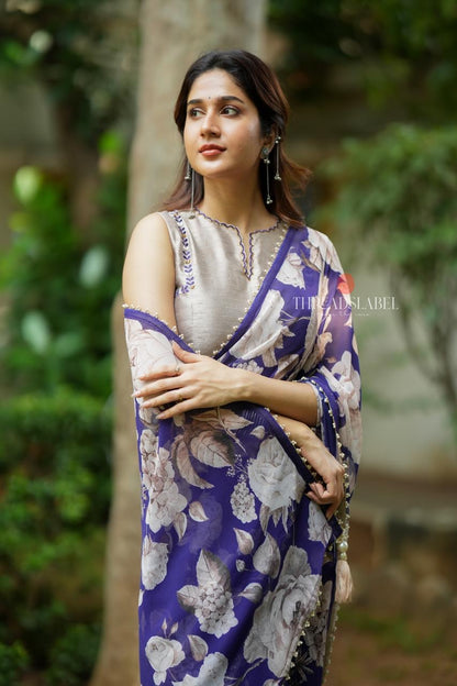 Purple chiffon floral saree with hand work blouse