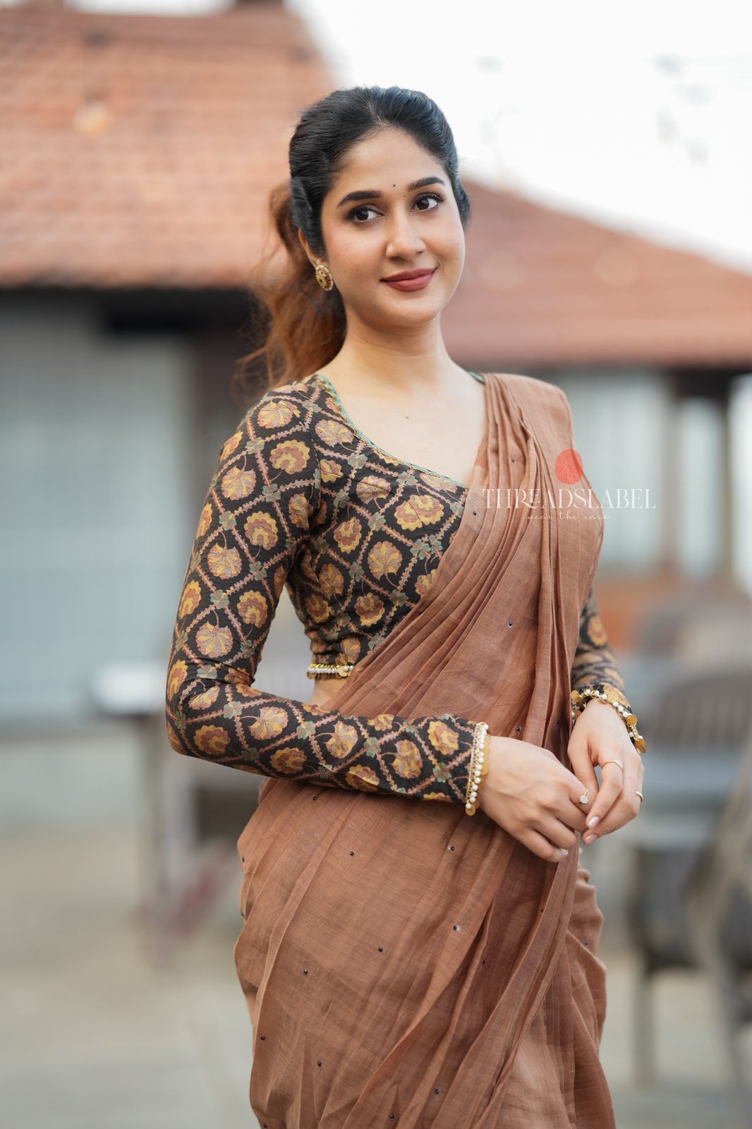 Brown malai chanderi saree with Ajrak print blouse