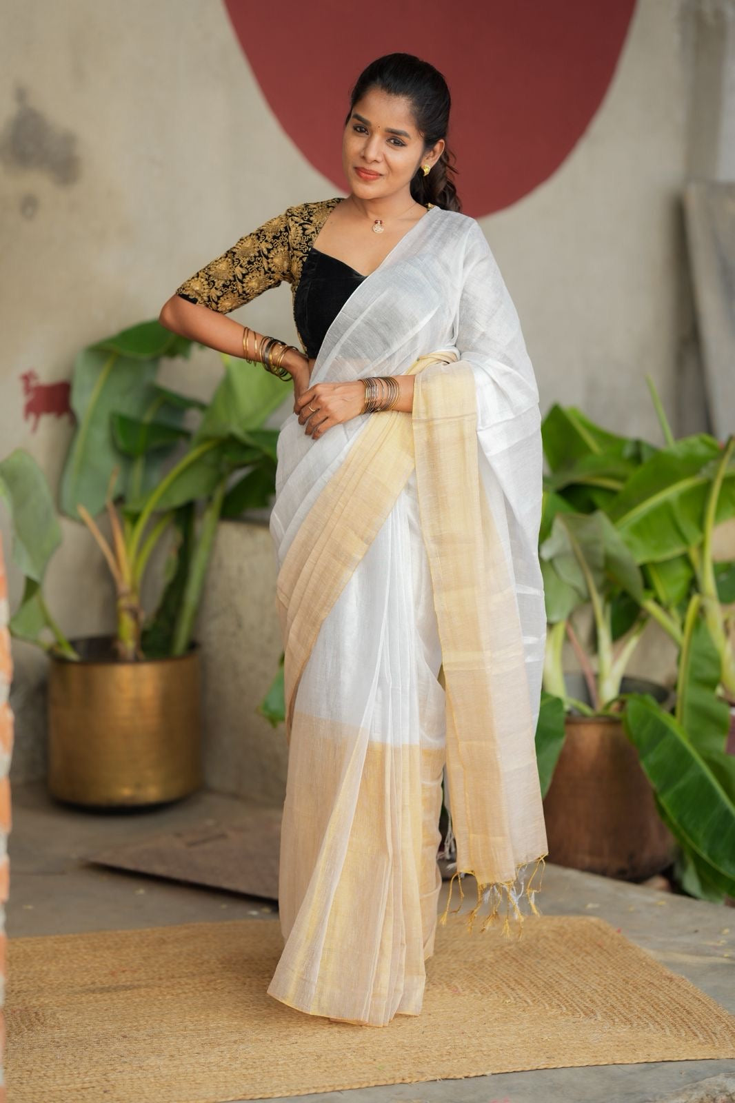 White soft tissue saree with heavy embroidery blouse
