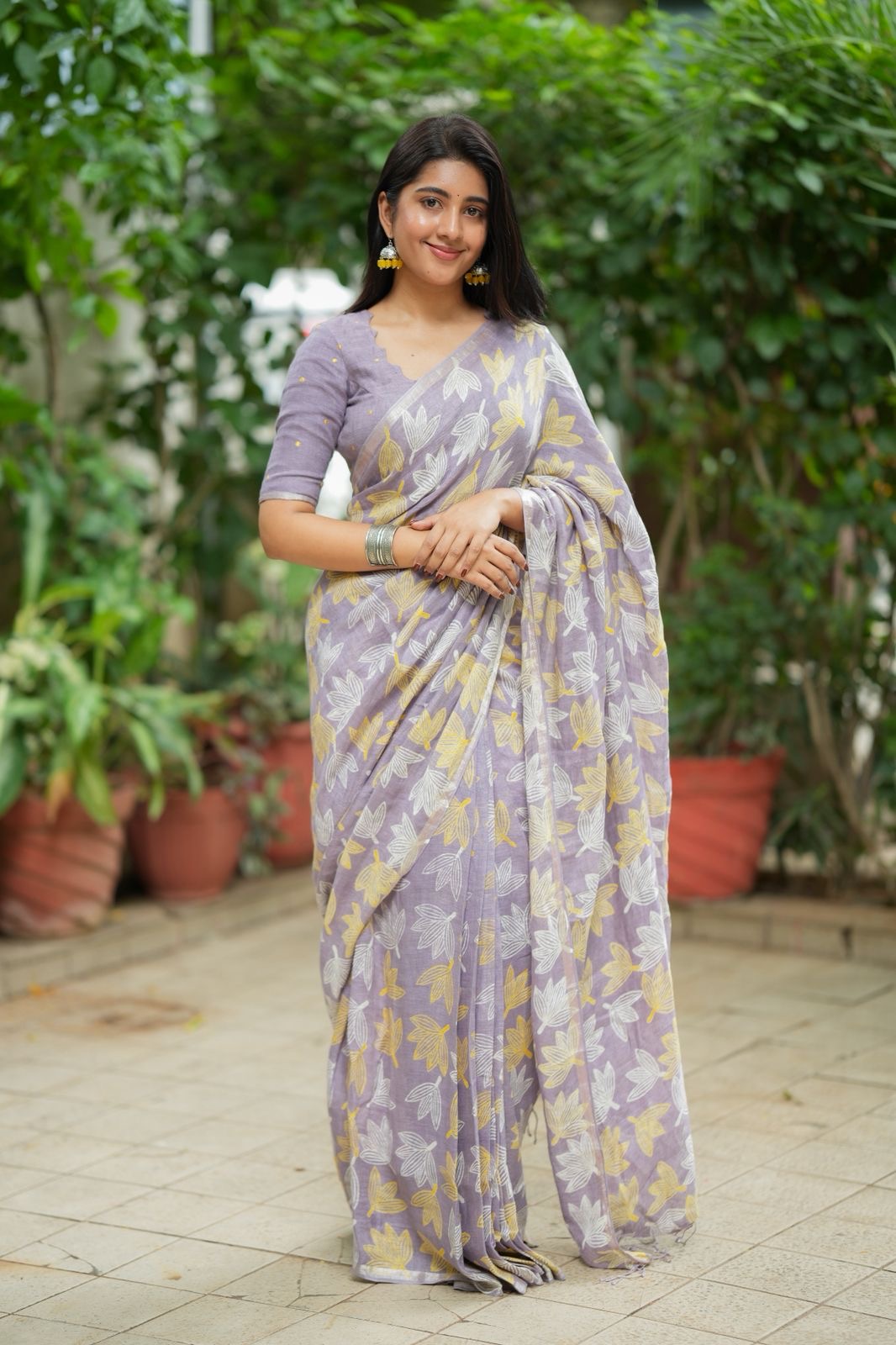 Lavender linen floral saree with hand work blouse