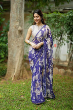 Purple chiffon floral saree with hand work blouse