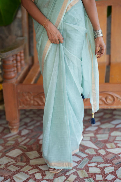 Aqua blue kota doria saree with hand work blouse