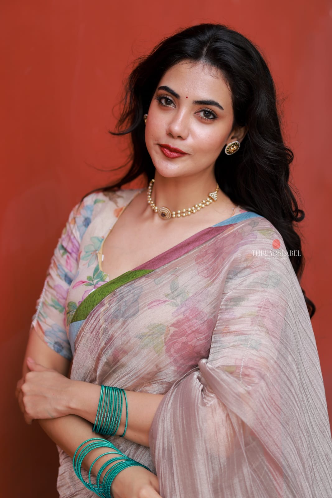 Dusty silver tissue saree with pearl hand work blouse