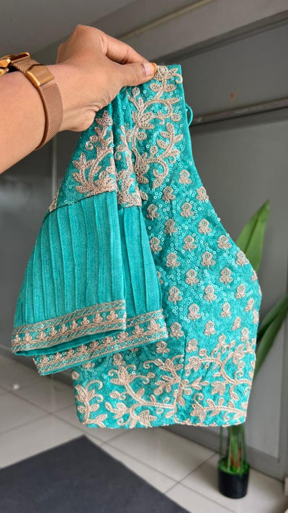 Cyan blue organza saree with blue embroidered blouse