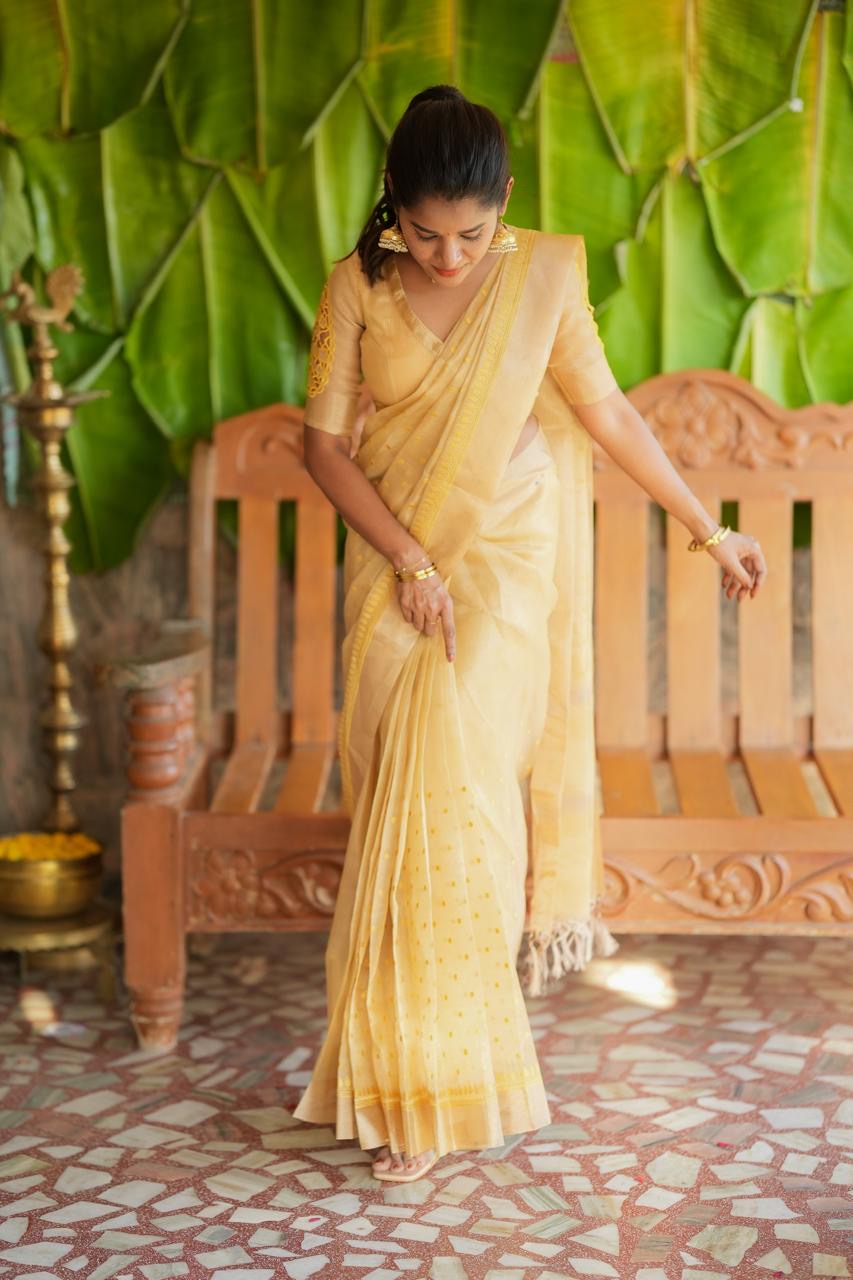 Gold kota doria saree with hand work blouse
