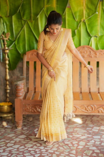 Gold kota doria saree with hand work blouse