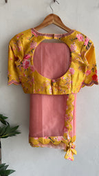 Peach organza saree with yellow floral hand work blouse