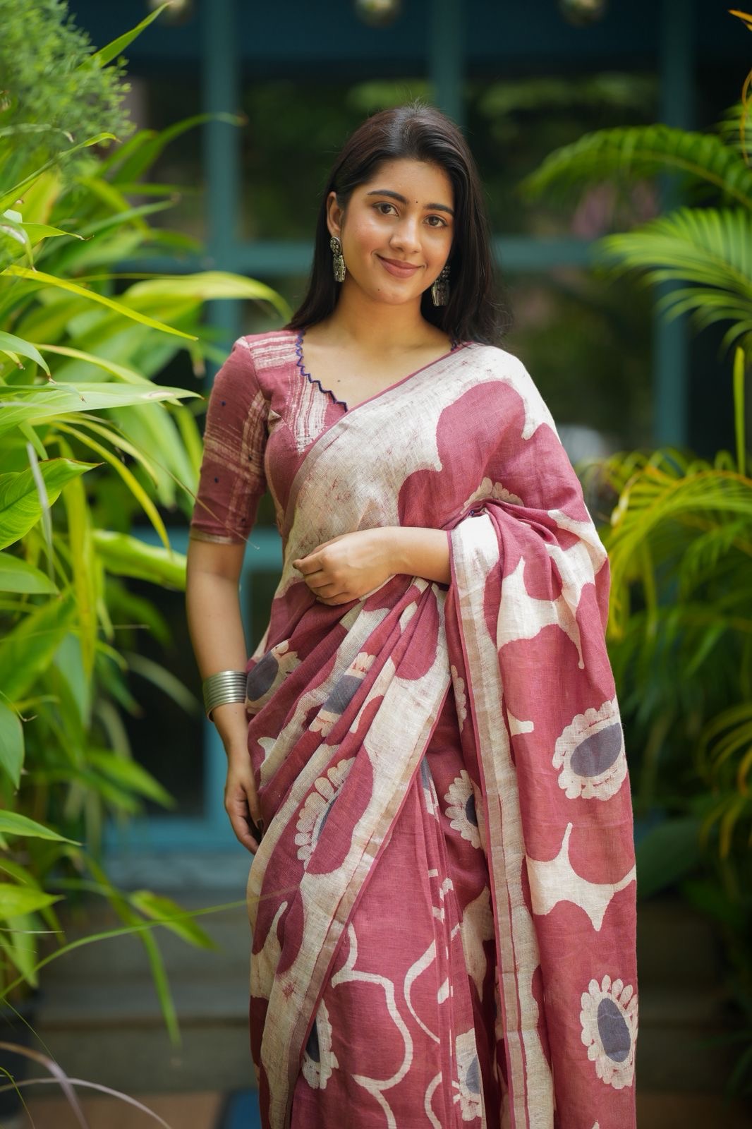 Brown linen floral saree with hand work blouse