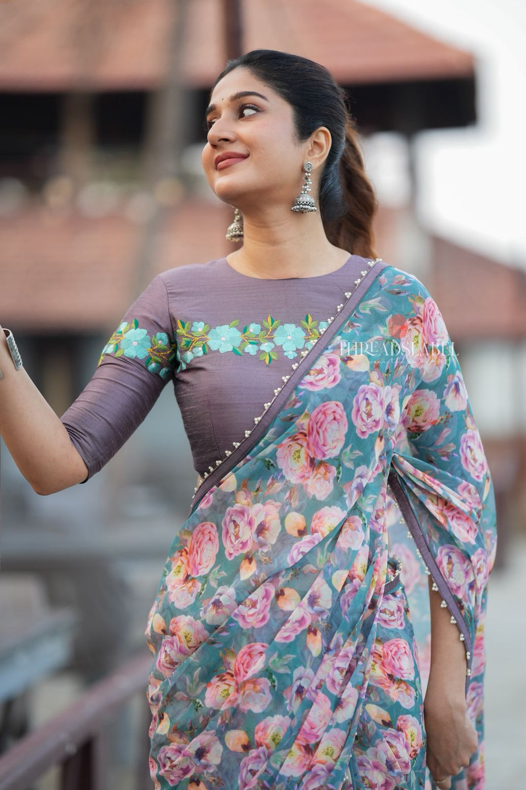 Blue floral georgette saree with grey embroidery blouse