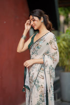 Half white chiffon floral saree with hand work blouse