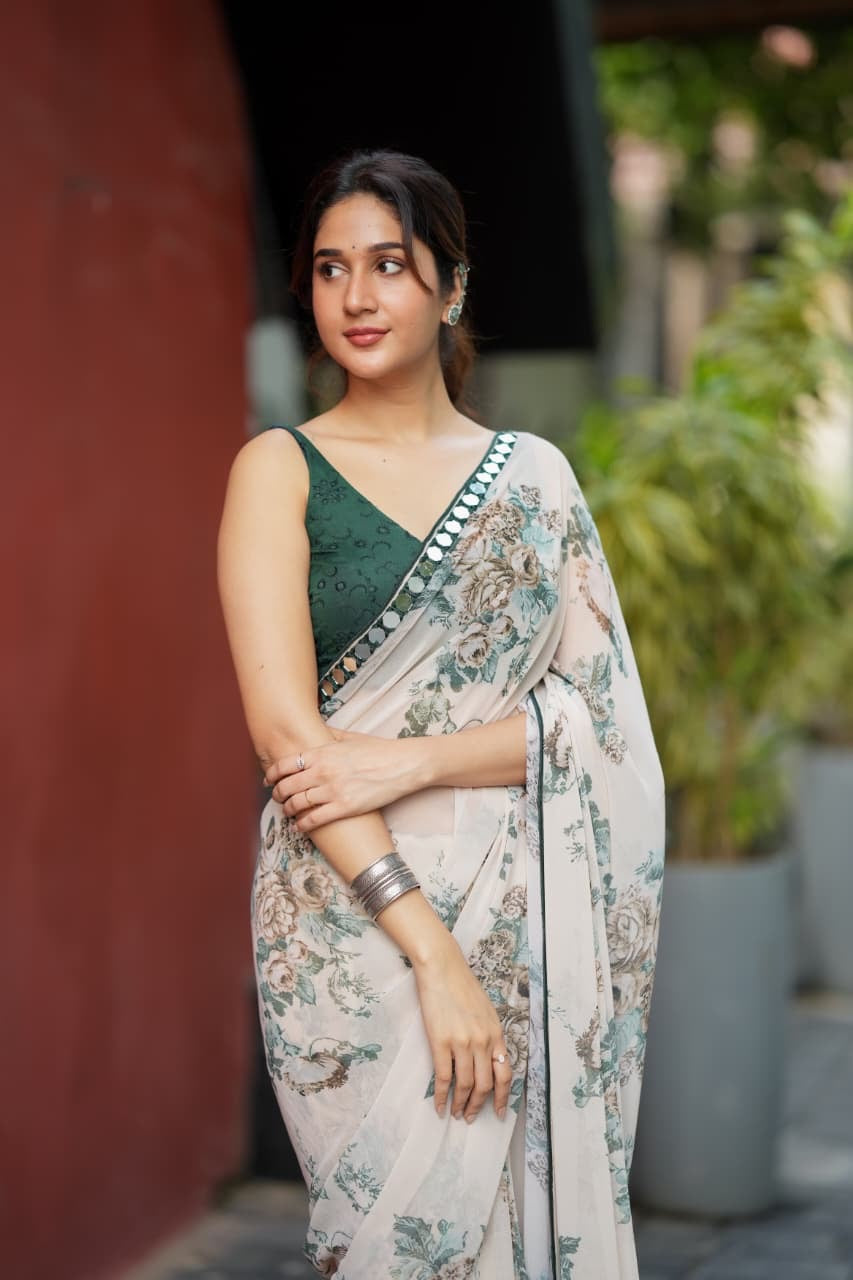 Half white chiffon floral saree with hand work blouse