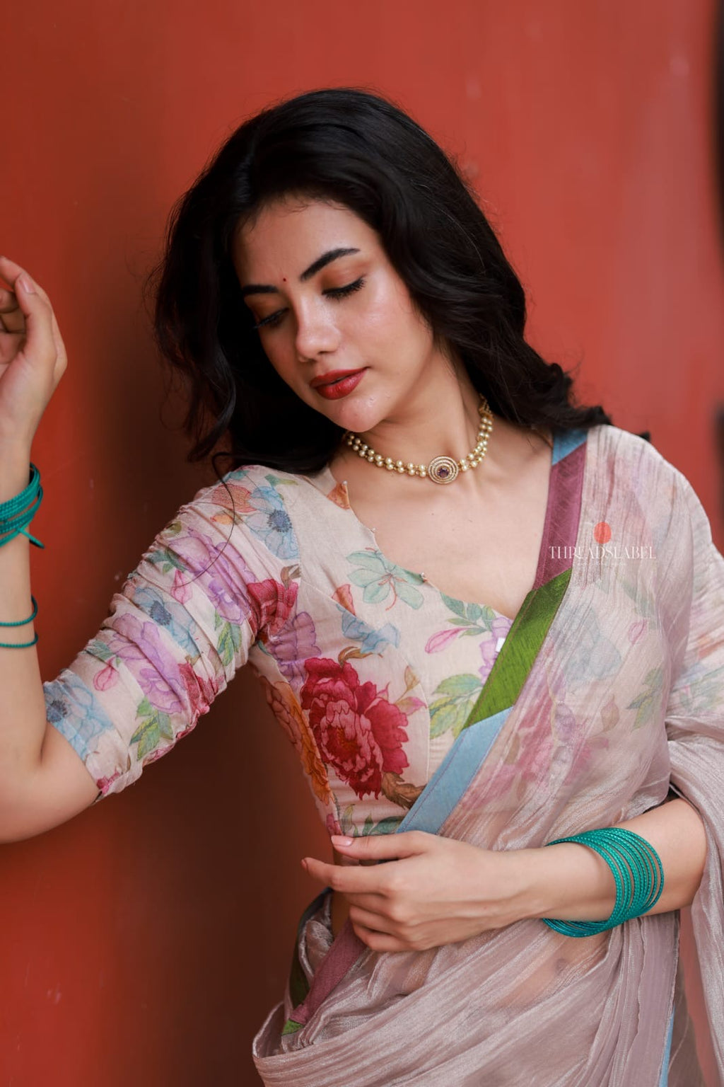 Dusty silver tissue saree with pearl hand work blouse