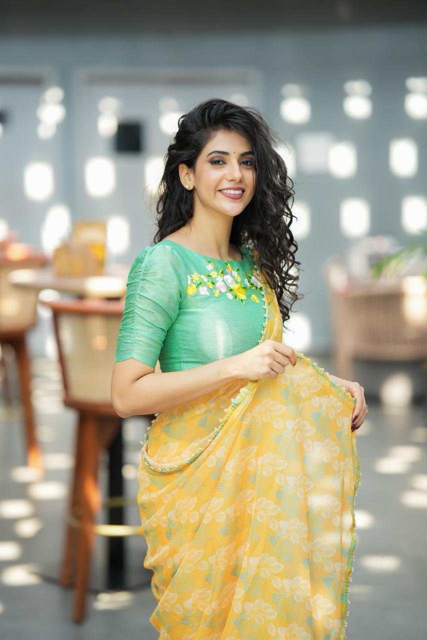 Green tissue floral hand work blouse (only blouse)