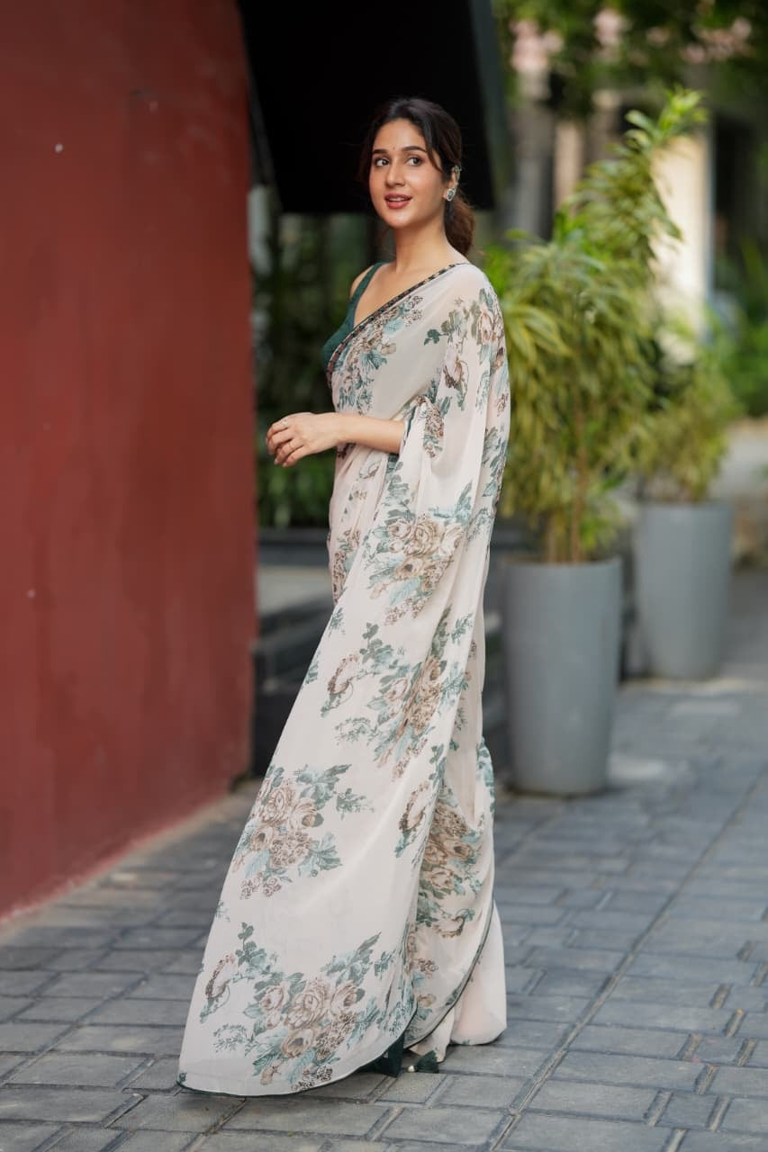 Half white chiffon floral saree with hand work blouse