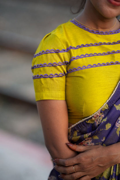 Blue floral tissue saree with lime hand work blouse