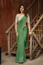 Green mul chanderi saree with halfwhite embroidery blouse