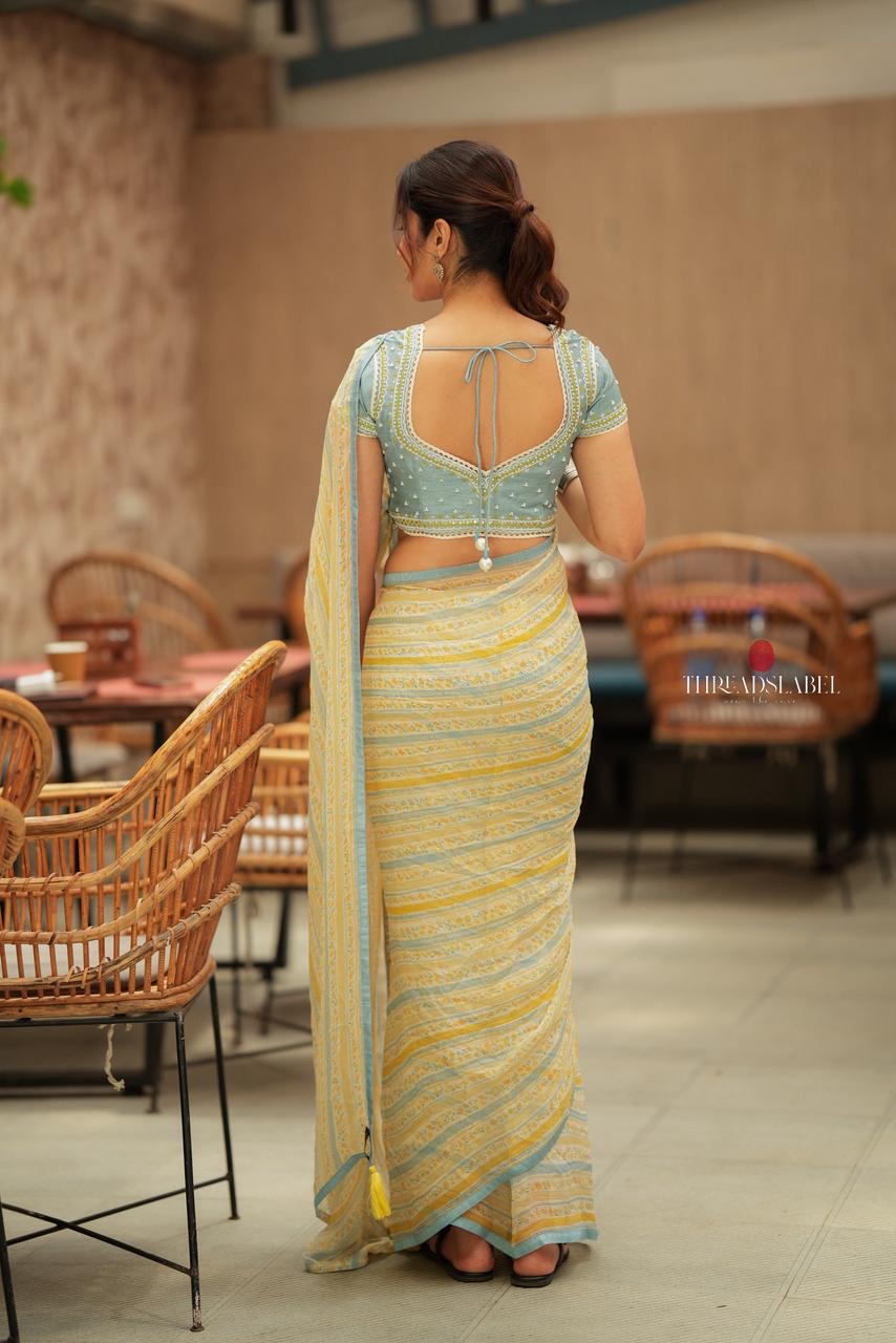 Western yellow & blue chiffon striped saree with hand work blouse