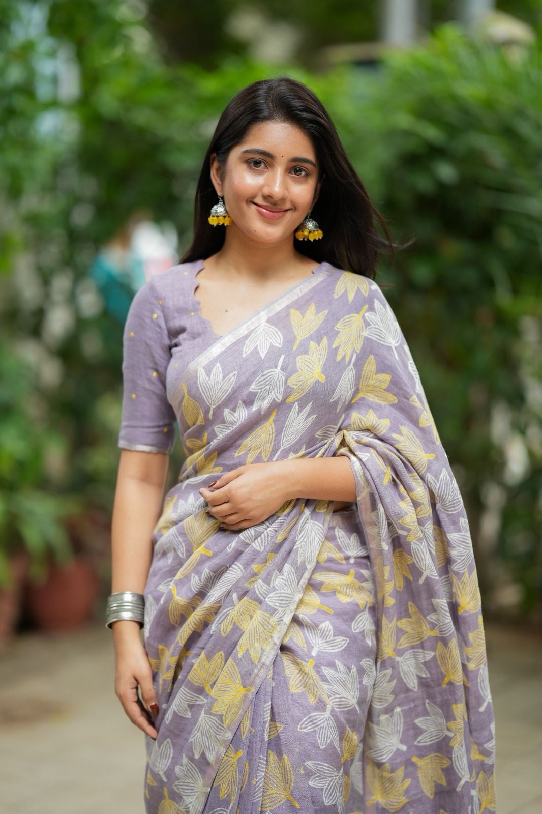 Lavender linen floral saree with hand work blouse