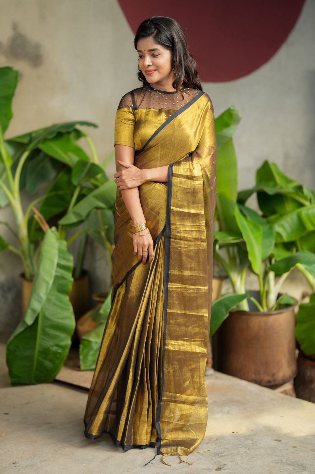 Golden soft tissue saree with hand work blouse