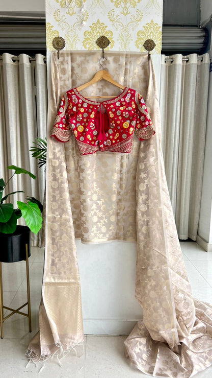 Half white banarasi saree with deep pink silk hand embroidery blouse