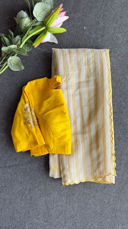 Yellow & cream stripped tissue saree with bird work blouse