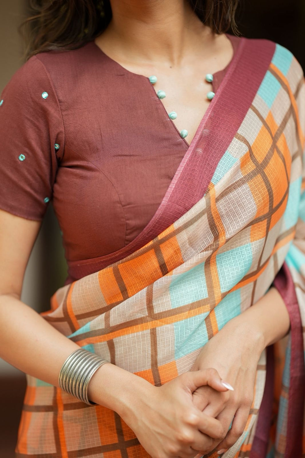 Multi checked kota saree with brown embroidery blouse
