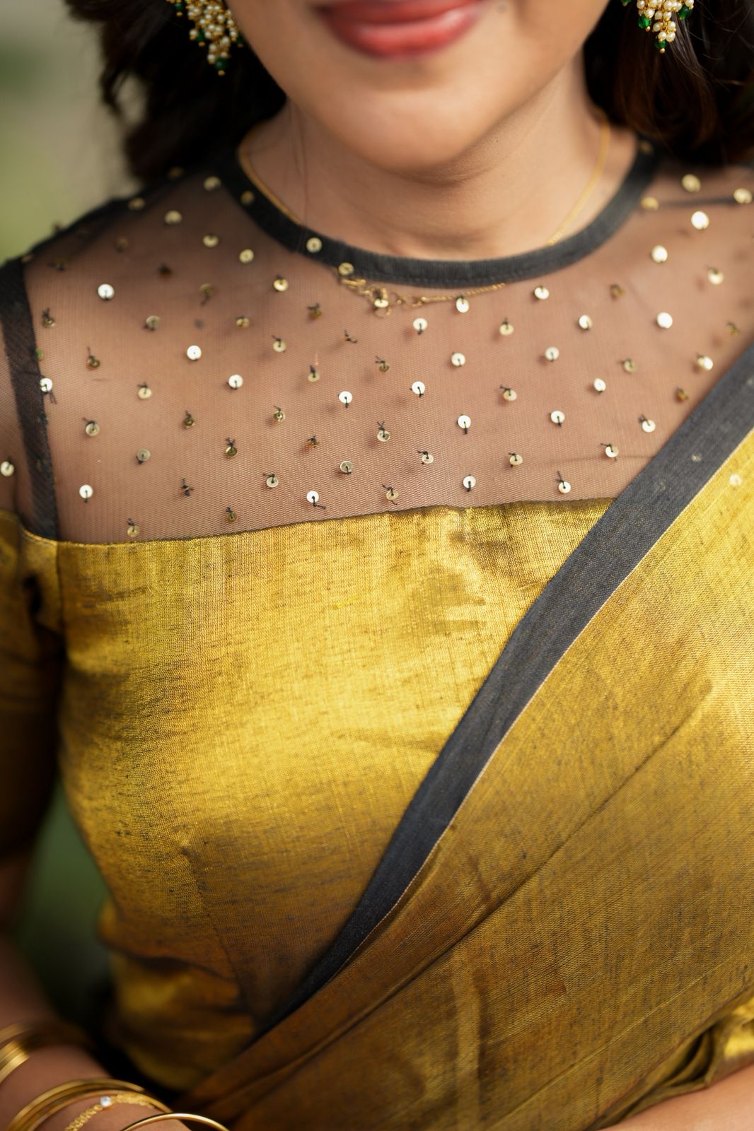 Golden soft tissue saree with hand work blouse