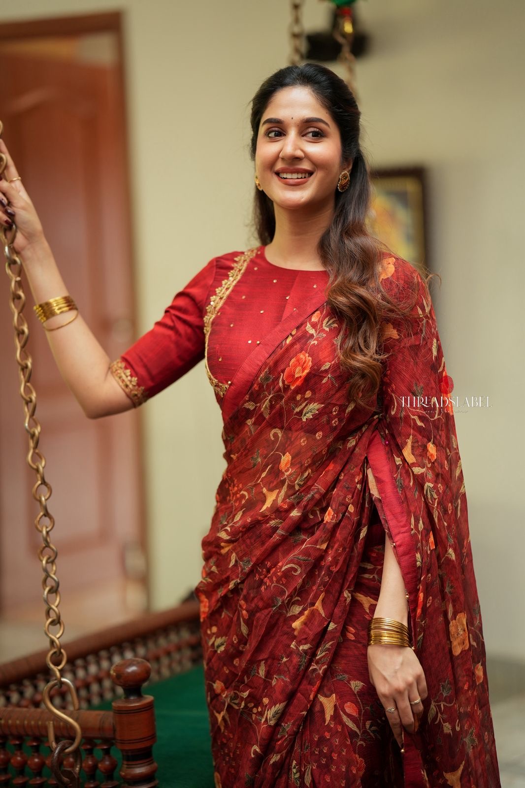 Maroon chiffon floral saree with hand work blouse