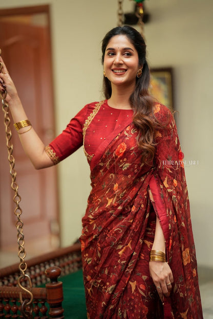 Maroon chiffon floral saree with hand work blouse