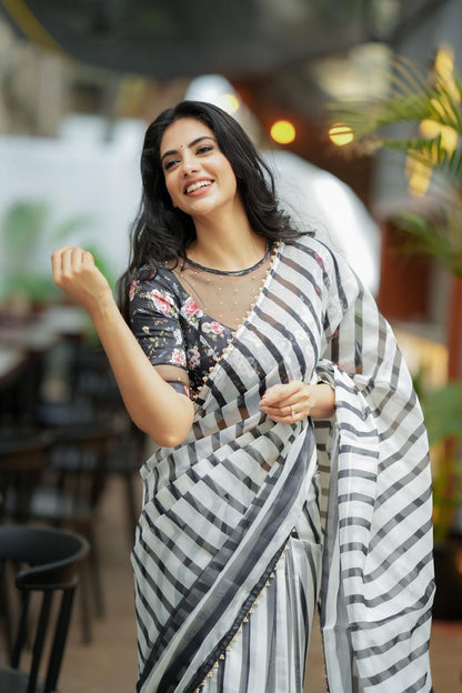 Black & white stripe organza saree with hand work blouse