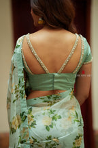 Sea green viscose jute floral saree (only saree)