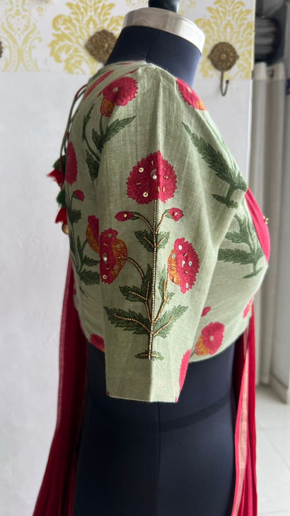 Maroon pure kota saree with green hand work blouse